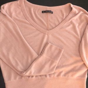 Light pink women’s cropped sweater